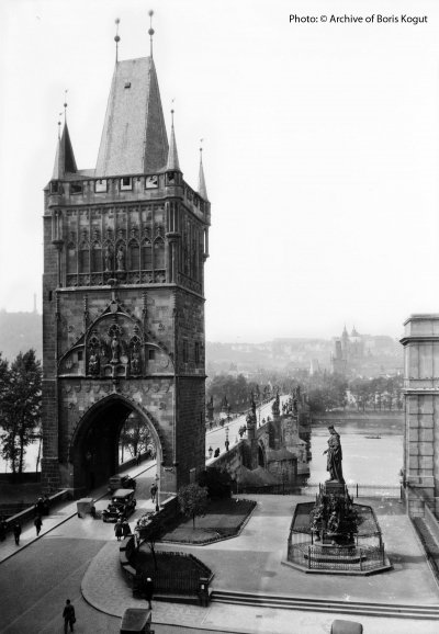Křižovnické Square with the Old Town Bridge Tower and the Gothic monument to Charles IV